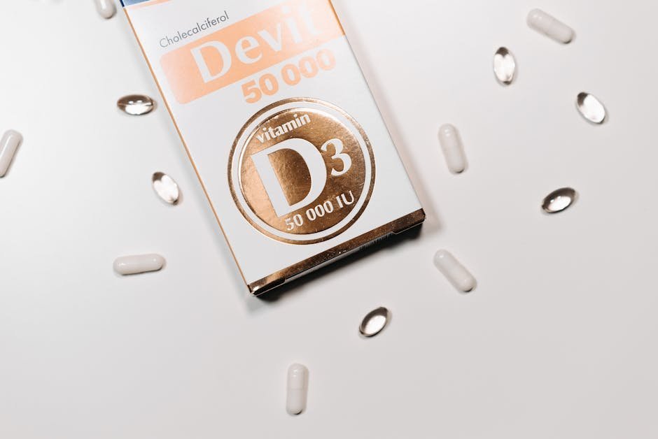 Vitamin D capsules with sunlight streaming through window onto wooden table