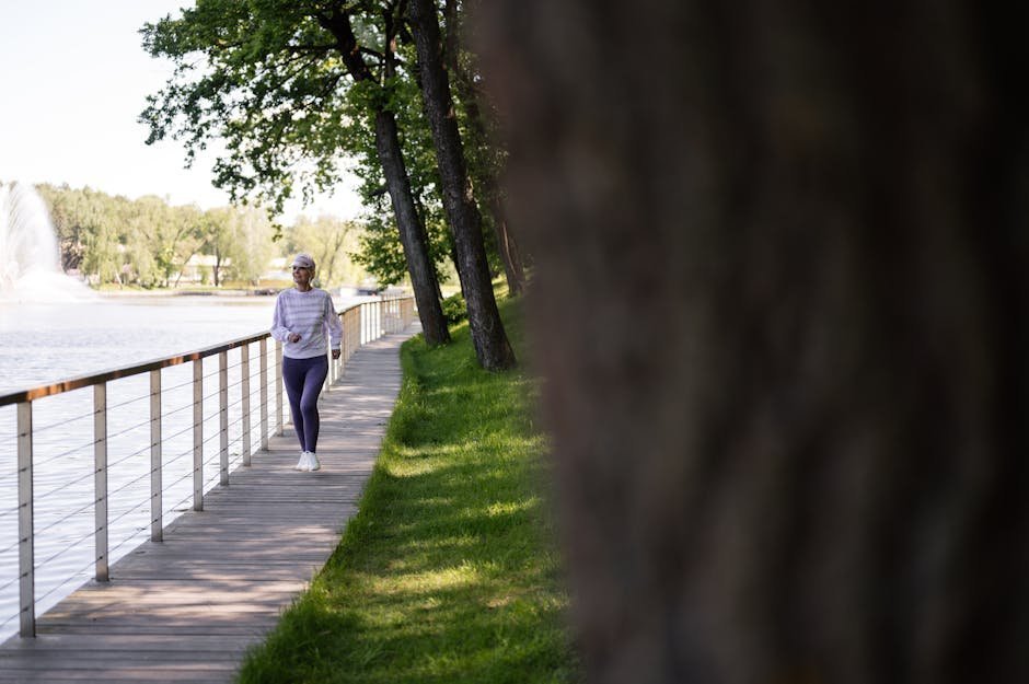 Person walking outdoors in sunshine for vitamin D synthesis through skin